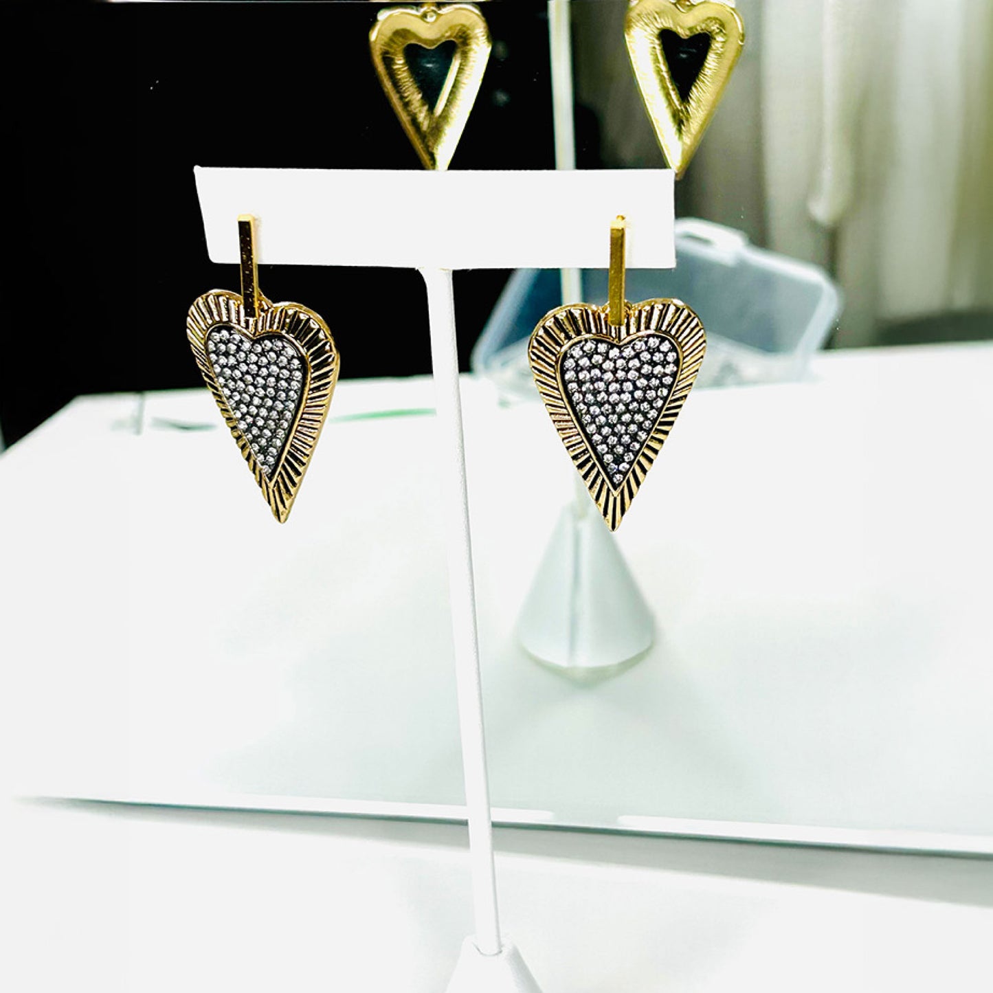 Elegant gold silver heart earrings with rhinestones.