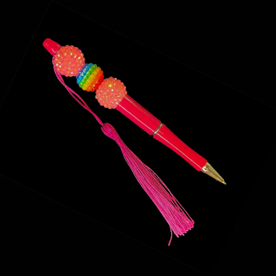 Hot pink pen with multicolor beads and tassel